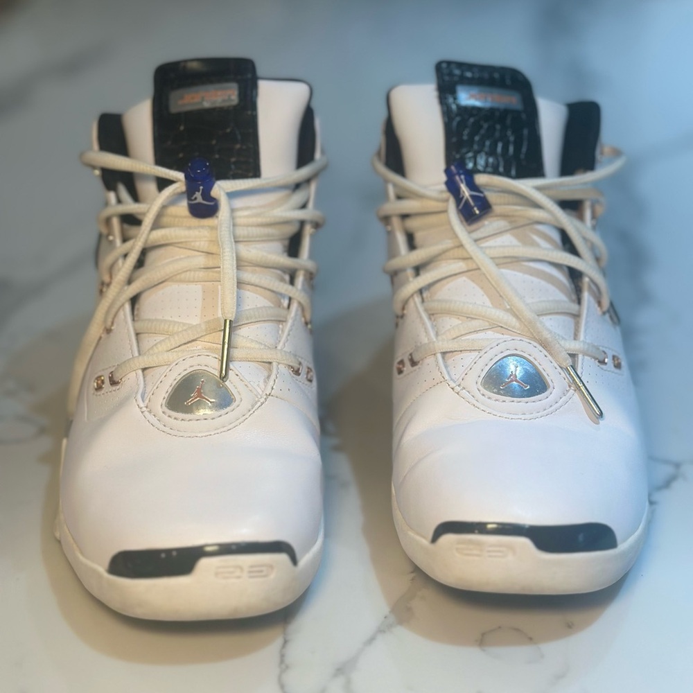 (C) Jordan men’s White and Black Sneakers with Blue Accents